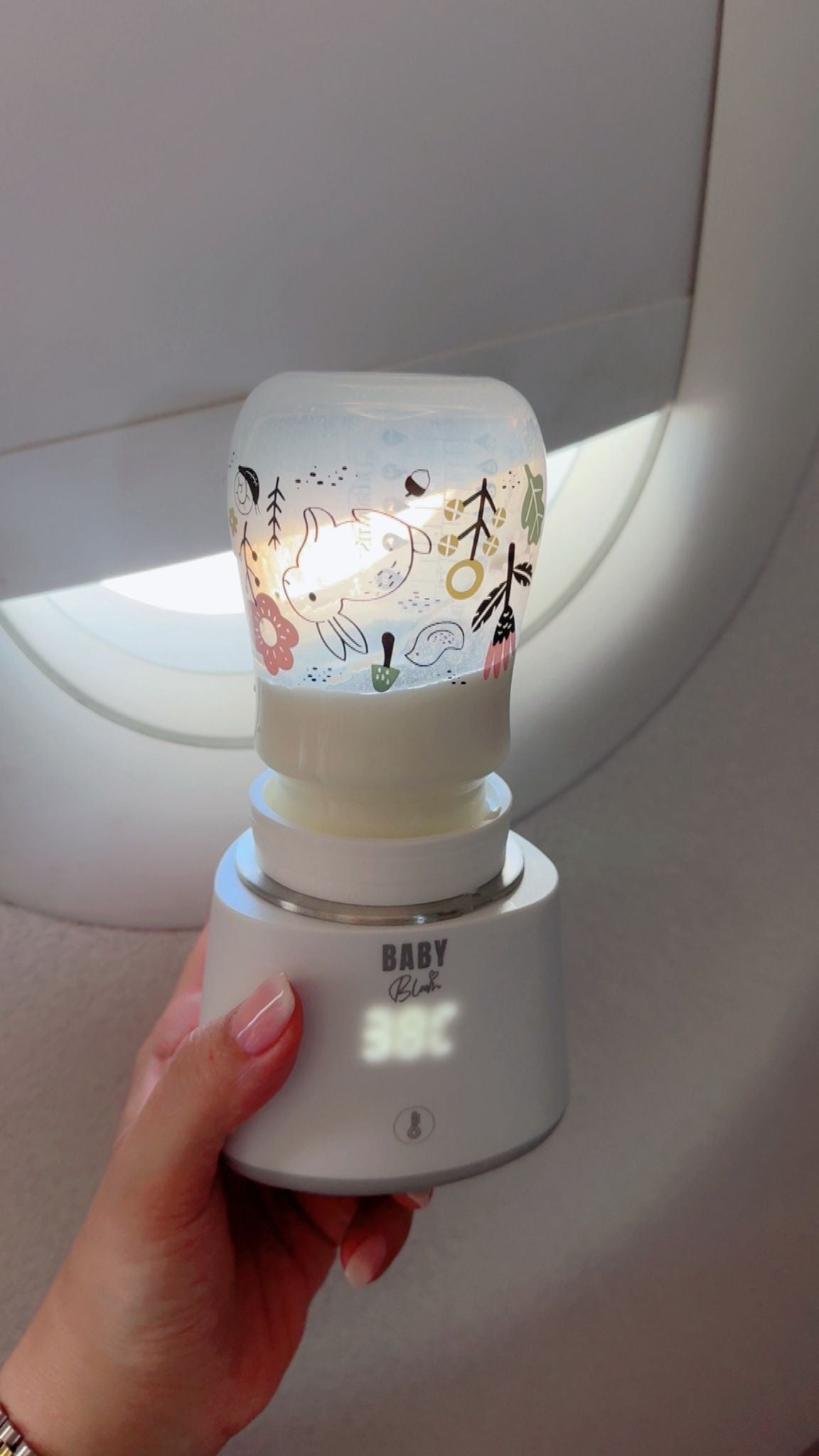 جهاز تدفئة الزجاجات المحمول من بيبي بلوم مع ٥ أدابتر