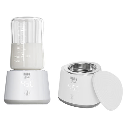 جهاز تدفئة الزجاجات المحمول من بيبي بلوم مع ٥ أدابتر