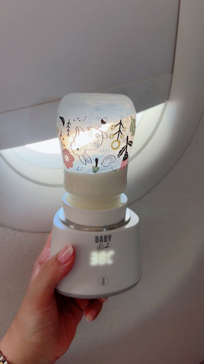 جهاز تدفئة الزجاجات المحمول من بيبي بلوم مع ٥ أدابتر