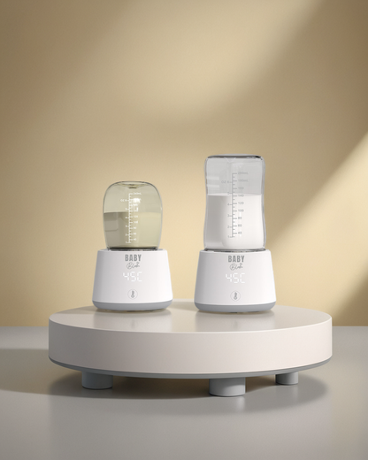 جهاز تدفئة الزجاجات المحمول من بيبي بلوم مع ٥ أدابتر