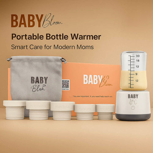 جهاز تدفئة الزجاجات المحمول من بيبي بلوم مع ٥ أدابتر